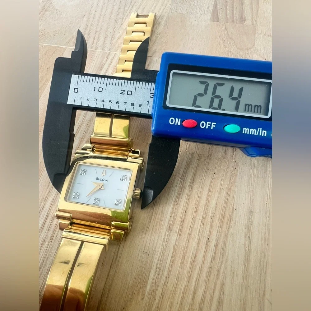 Rare Bulova ladies rectangular gold tone diamond dress watch NEW BATTERY